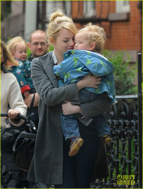 Emma Stone Carries Andrew Garfields Nephews Photo 2655321 Emma