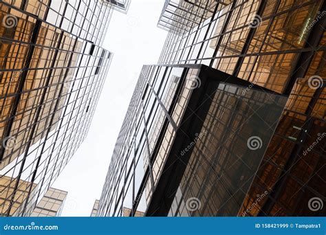Golden Building Windows Glass Of Modern Office Skyscrapers In