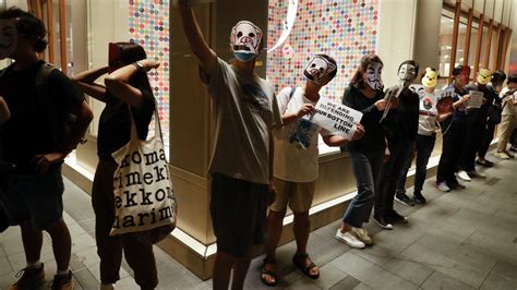 Hong Kong Protesters Don Cartoon Masks To Defy Face Mask Ban