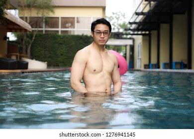 Sexy Asian Man Wearing Glasses Swimming Stock Photo 1276941145