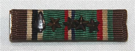 H125 Wwii Eame Ribbon Bar With Arrowhead And Four Stars B And B Militaria