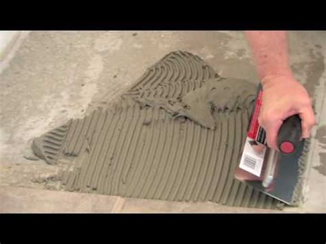 Installing tiles on concrete subfloor requires plenty of preparation, but it can be done without a contractor. Thinset on Concrete - YouTube
