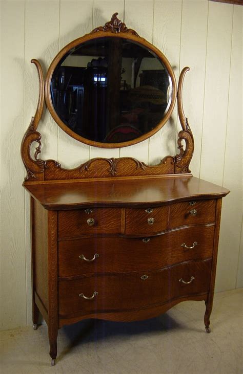 The two single top drawers each feature faux double drawer faces to. 15 Collection of Antique Oak Mirrors | Mirror Ideas