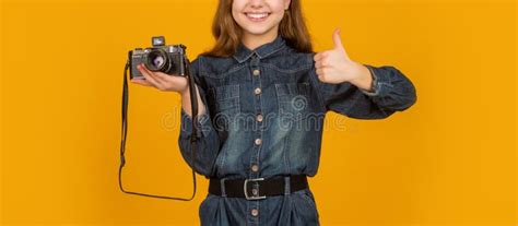 Happy Teen Photographer Crop View Giving Thumb Up Approval Sign Holding