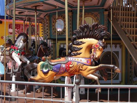 Racing Horse Chance Rides Double Decker Carrousel On The Galveston