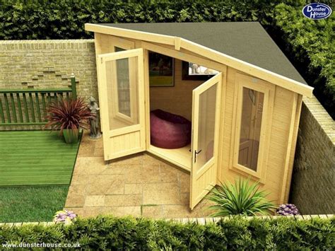 An Overhead View Of A Garden Shed With Its Doors Open And A Bed In The