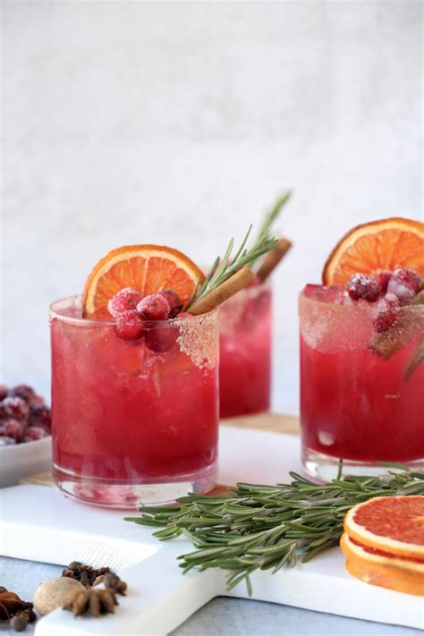 spiced cranberry paloma cocktail and punch recipe christmas drinks recipes spiced drinks