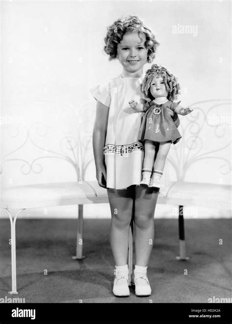 Shirley Temple With A Shirley Temple Doll Ca 1935 Stock Photo Alamy