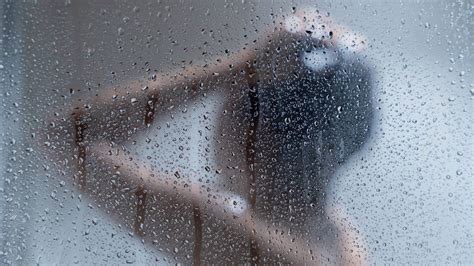 Woman In Shower Catches Man Staring Through Bathroom Window