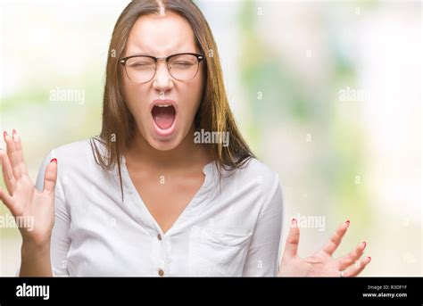 Young Caucasian Beautiful Business Woman Wearing Glasses Over Isolated