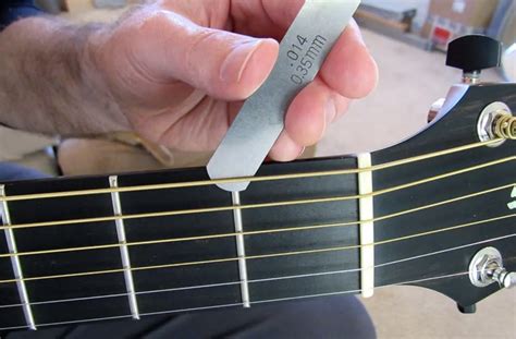 The Action Is The Distance Between The String And The Fretboard How To