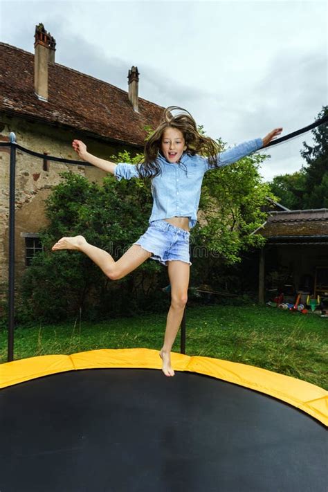 Cute Teenage Girl Jumping On Trampoline Stock Image Image Of Summer
