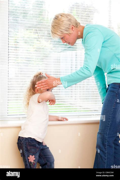 Mother Slapping Smacking Babe As Punishment Stock Photo Alamy