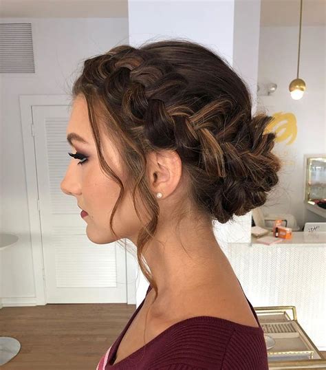 this gorgeous braided updo is perfect for holiday parties hairstyle by goldplaited braided