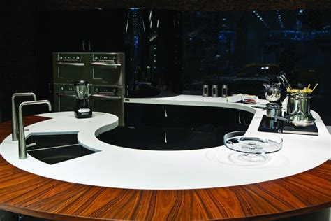 An Oval Kitchen Island With A White Worktop Design The Steel Decor