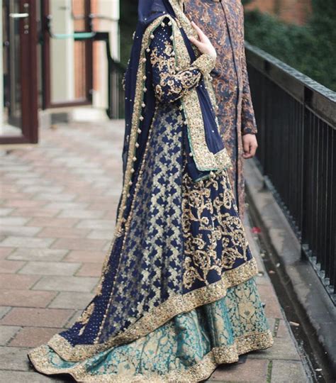 The dupatta in organza has gracefully embellished borders that gives the bridal dress a classic royal touch. Beautiful royal blue colour♡♡♡ | Pakistani bridal dresses ...