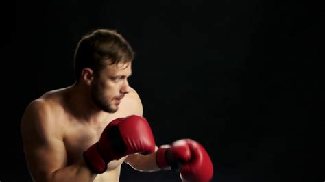 Handsome Fighter In Red Gloves Is Boxing Young Confident Boxer