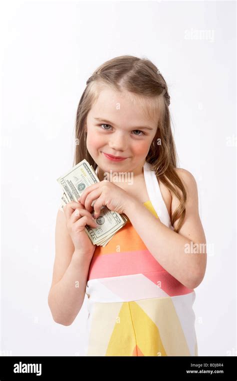 Girl With Money Stock Photo Alamy
