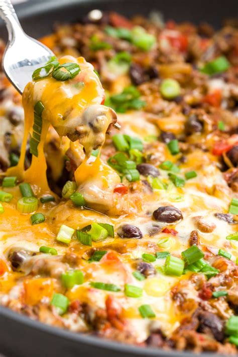 Make Dinner Time A Little Messier With This Cheesy Taco Skillet