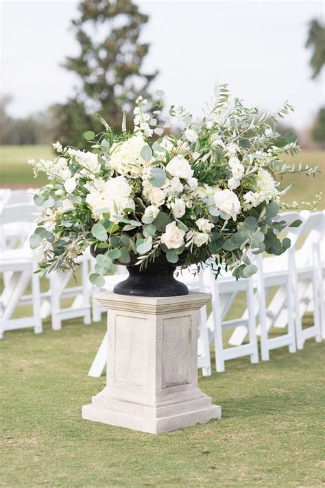 Large Outdoor Wedding Arrangement Of White Hydrangea White Lisianthus