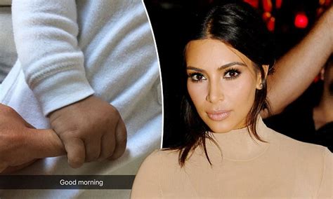 Kim Kardashian Shares Photo Of Onesie Clad Son Saint Squeezing Her