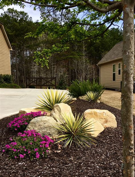 Landscaping With Rocks Boulders Phlox And Rosemary Landscaping