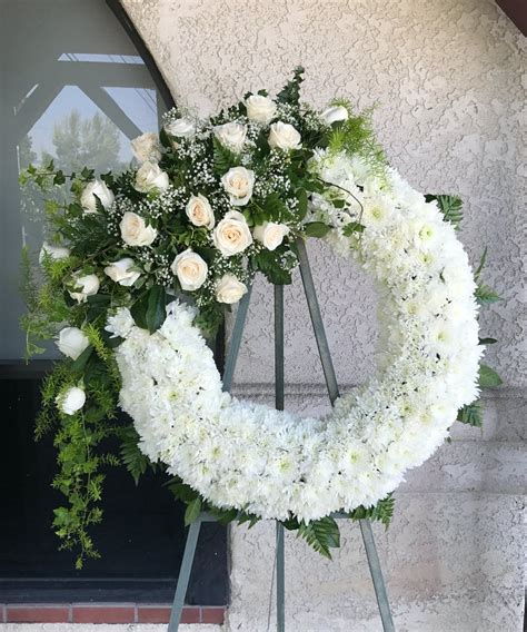 Browse these touching tributes online or call us directly for personalized assistance. Pure White Sympathy Wreath | Rowland Heights Funeral Flowers