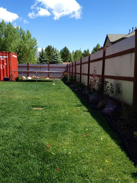 You can use corrugated metal in a bright color to frame your patio or in a bare metal next to brightly colored walls to offset the color. corrugated metal fence diy