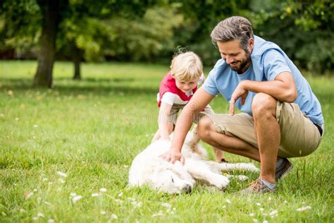 Father And Son Pet Dog Stock Image Image Of Spring 108832781
