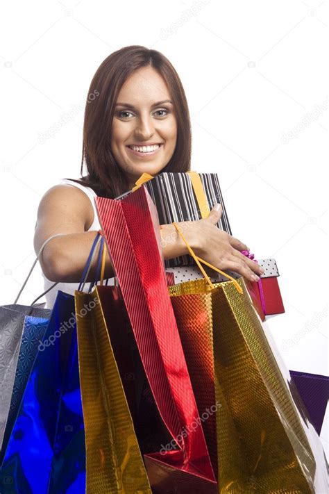Mujer Joven Bonita Con Bolsas De Compras Fotografía De Stock