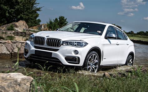 The bmw x6 is an suv. Comparison - BMW X6 xDrive35i 2018 - vs - BMW X6 xDrive50i ...