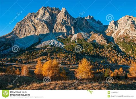 Scenic View Of The Lagazuoi Mountain In Sunlit At Autumn Morning