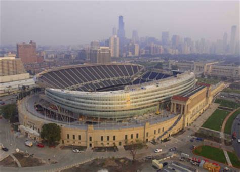 The iconic stadium on the lakefront serves as a memorial to american soldiers who have died in wars. Soldier Field | rocktourdatabase.com