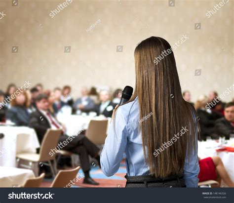 Beautiful Business Woman Is Speaking On Conference Stock Photo