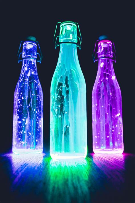 Download Wallpaper 800x1200 Bottles Neon Light Liquid