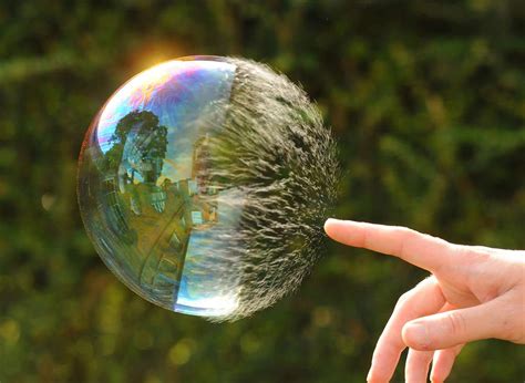 Interesting Photo Of The Day Popping A Bubble