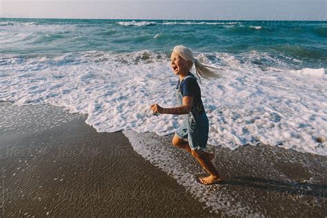 Running Along The Waves By Evgenij Yulkin