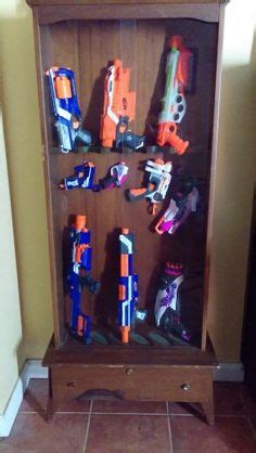 Need a cool looking place to put your nerf guns. Nerf gun rack made from old pallets, every house needs one ...