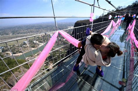 Chinese Couples Find Creative Ways To Kiss On Bridge Daily Mail Online