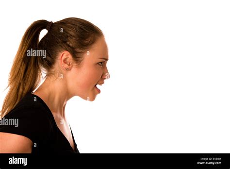 Angry Young Woman Screams Into A Copy Space Isolated Stock Photo Alamy