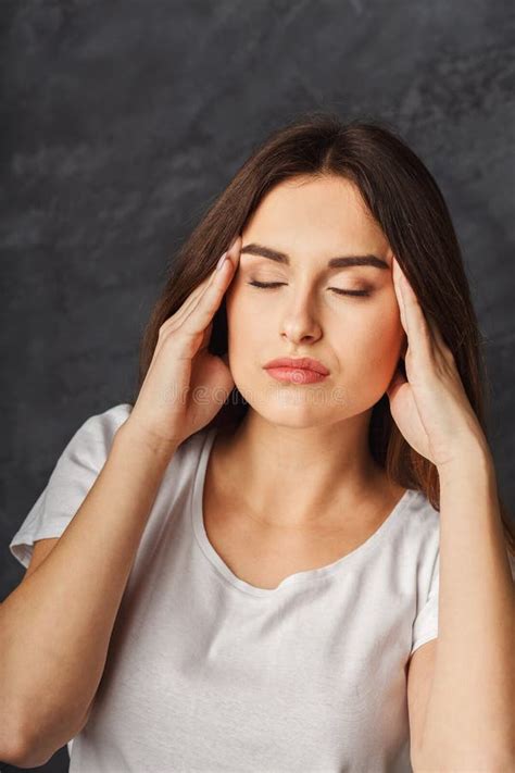 Portrait Of Young Woman Having Headache Stock Image Image Of Gray
