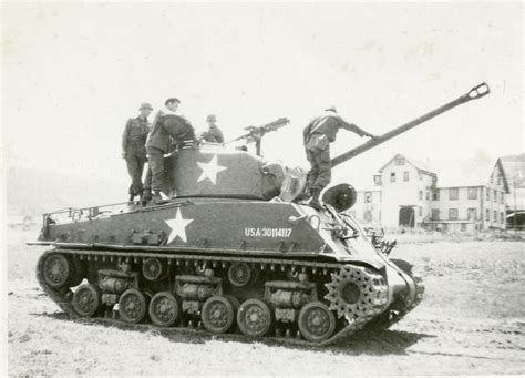 Four American Soldiers On Top Of A Tank 1944 The Digital Collections