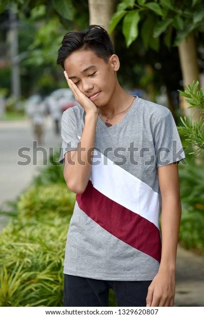 Sad Young Filipino Youth Stock Photo 1329620807 Shutterstock