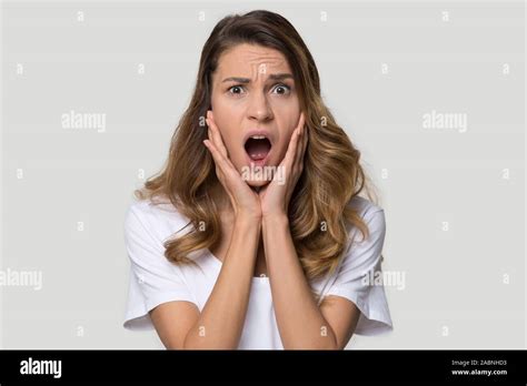 Shocked Scared Woman Screaming Feeling Afraid Looking At Camera Stock Photo Alamy