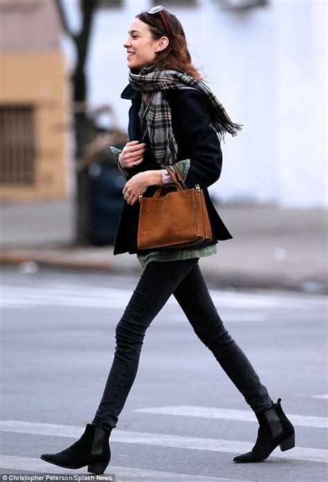 Take things up a notch. Alexa Chung is in high spirits as she steps out in skinny ...