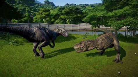 Jurassic World Evolution Indominus Rex Vs Tyrannosaurus Rex Youtube