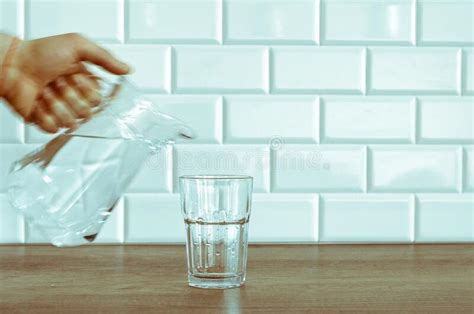 526 Hand Pouring Water Glass Jug Stock Photos Free And Royalty Free