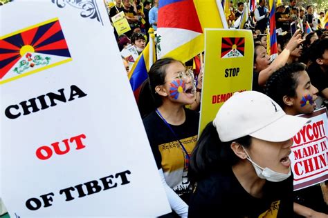 Thousands Of Tibetans Protest On 60th Anniversary Of Uprising Against
