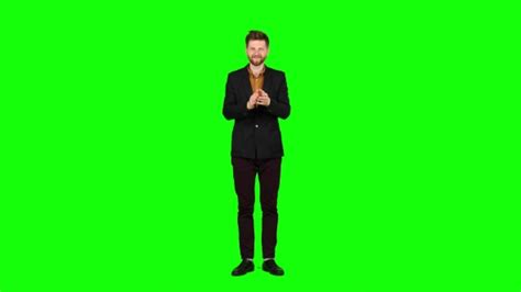 Man Looks At The Concert And Applauds The Actors Green Screen Stock