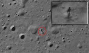 Shadow Resembling Alien Like Figure Captured Beside Craters On The